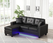 Sorenza 74"W Black PVC Reversible Sectional Sofa Chaise