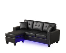 Sorenza 74"W Black PVC Reversible Sectional Sofa Chaise