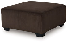 Kimlee - Sectional And Ottoman Set