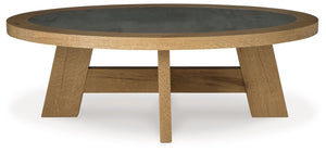 Brinstead - Light Brown - Oval Cocktail Table