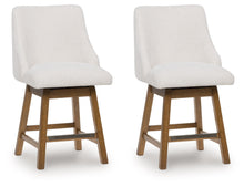 Cabalynn - Oatmeal / Light Brown - Upholstered Swivel Barstool (Set of 2)
